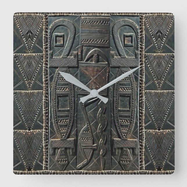 Reloj de tallado africano (Anverso)