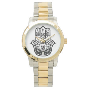 reloj de tonos dorados y plateados, hamsa, fatima