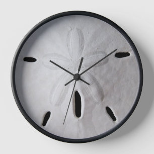 Reloj de verano de playa blanca y negra de arena