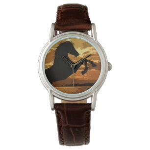 Reloj ecuestre de caballos con puesta de sol