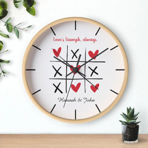 Reloj El triunfo del amor siempre nombre de la pareja de