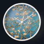 Reloj Elegancia intemporal: la flor de almendras de Van<br><div class="desc">Eleva tu espacio con nuestro exclusivo reloj de pared Van Gogh's Almond Blossom de la nueva colección de arte retro de Zazzle. Sumérjase en la belleza intemporal de la obra maestra de Vincent van Gogh, realzada digitalmente para cautivar cada detalle. Esta impresión de alta calidad ostenta una resolución inigualable, que...</div>