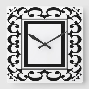 Reloj enmarcado blanco y negro adornado