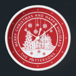 Reloj Feliz Navidad Felices Fiestas Invierno Personaliza<br><div class="desc">Merry Christmas Happy Holidays Winter Personalized Name Clocks incluye el texto "Feliz Navidad y Felices Fiestas" en un guión blanco moderno con un fondo rojo y personalizado con tu nombre rodeando una casa con árboles de Navidad y copos de nieve. Perfecto para Navidades de fiesta y regalos de vacaciones. Diseñado...</div>