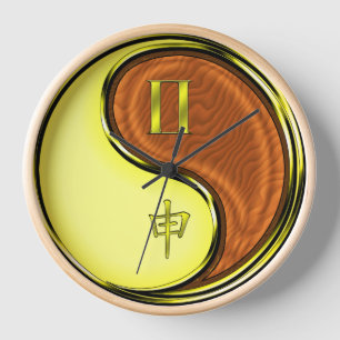 Reloj Géminis y Mono de Madera