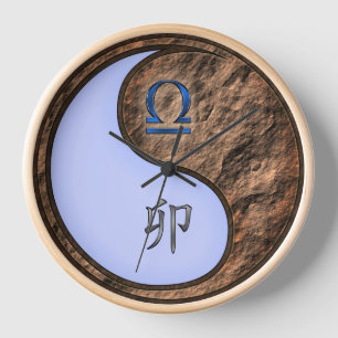Reloj Libra y Conejo de Tierra