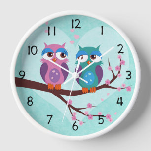 Reloj Los búhos aman en primavera personalizado lindo ni