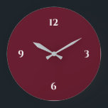 Reloj Minimalista grande de color burdeos<br><div class="desc">El reloj moderno presenta un diseño minimalista en una paleta de colores burdeos con acentos blancos. Un diseño sencillo y sencillo con números blancos sobre un fondo de color burdeos. Una moderna adición a su cocina, sala de estar o pared de oficinas, un moderno regalo de oficina o un moderno...</div>