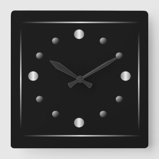 Reloj minimalista negro y plateado de pared