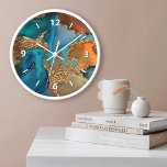 Reloj Moda de mármol de cristal acuarela color turquesa<br><div class="desc">Los números gráficos blancos superponen una acuarela abstracta rica, de color dorado, azul turquesa y naranja amarillo en este reloj de pared elegante, moderno y moderno. Tu elección de una cara de reloj redonda o cuadrada. Hace una declaración de bienvenida y elegante donde quiera que sea colgada. Una gran adición...</div>