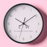 Reloj Nombre de monograma Minimalista rosado moderno Rub<br><div class="desc">Mejore su decoración en casa con nuestro elegante reloj de pared Minimalista clásico. Este exquisito reloj combina a la perfección la elegancia atemporal con el minimalismo contemporáneo, elevando el espacio vital a nuevos niveles de sofisticación. Diseñado con precisión y meticulosa atención a los detalles, este reloj de pared es más...</div>