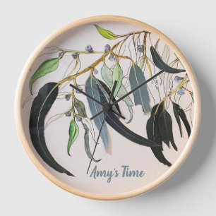 Reloj personal de madera con hojas de goma