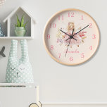 Reloj Pixie de jardín floral de hadas mágicas personaliz<br><div class="desc">Añade un toque de encanto a la habitación de tu pequeño con nuestro Reloj de Pixie de Jardín Flamenco Mágico Personalizado! Este reloj delicioso es la manera perfecta de añadir brillo y encanto a su espacio, ayudándoles a aprender a contar el tiempo. Diseñado con cuidado y atención a los detalles,...</div>