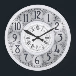 Reloj Redondo Grande Art Deco Elegante regalo elegante de unisex de pla<br><div class="desc">Un ilustracion vintage Art Deco con círculos falsos de plata bordeados por negros alrededor de los cuales aparecen garabatos de remolinos negros está enmarcado por un círculo blanco más pequeño en el que aparecen números romanos.</div>