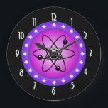 Reloj Redondo Grande Atomic Symbol on a Pink background<br><div class="desc">Science themed image. A circular shaped image with the symbol of the atom inside. A pink background contrasts with the black symbol. A purple border with white stars circles around the illustration. A funky image for geeks and science buffs.</div>