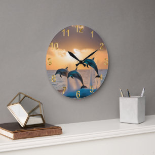 Reloj Redondo Grande Bailando en el atardecer: Tres delfines saltando