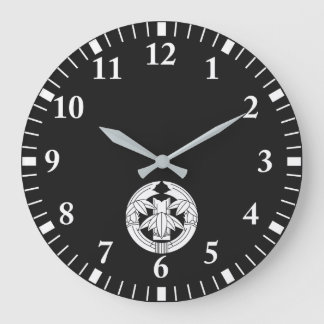 Reloj Redondo Grande Bambú cortado en hojas de bambú que abrazan