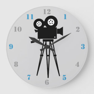 RELOJ REDONDO GRANDE CÁMARA DE PELÍCULA Y TRIPOD CON NÚMEROS GRIS Y