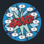 Reloj Redondo Grande Cómic Book Pop Art BANG<br><div class="desc">Relajados relojes pop de historietas de superhéroes de moda que seguro añaden un toque de color a una amplia gama de habitaciones alrededor de su casa u oficina. Una manera ideal de tratarte a ti mismo o a alguien que conozcas con estos geniales y únicos relojes de diseño de historietas....</div>