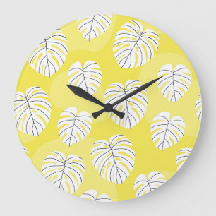 Reloj Redondo Grande Hojas de monstera, fondo amarillo brillante.