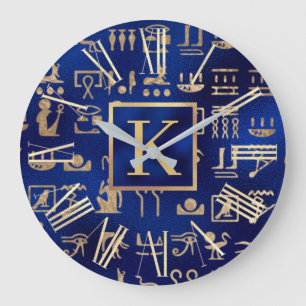 Reloj Redondo Grande Jeroglíficos Egipcios Dorados sobre Inicial Azul