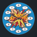 Reloj Redondo Grande Libro cómico Pop Art KA-POW<br><div class="desc">Relajados relojes pop de historietas de superhéroes de moda que seguro añaden un toque de color a una amplia gama de habitaciones alrededor de su casa u oficina. Una manera ideal de tratarte a ti mismo o a alguien que conozcas con estos geniales y únicos relojes de diseño de historietas....</div>