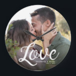 Reloj Redondo Grande LOVE Modern Simple Script Elegant Keepsake<br><div class="desc">Elegant modern wedding keepsake for Newlyweds, Valentine's Day, anniversaries, showcasing your favorite wedding or engagement photo with modern script calligraphy reading LOVE over your custom names and date over a dark gradient to make the typography stand out.</div>