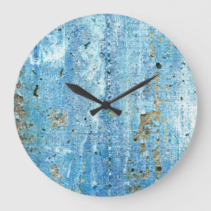 Reloj Redondo Grande Muro de hormigón texturado, manchas de óxido.