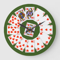 Naipes del juego de los corazones en fondo verde