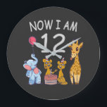 Reloj Redondo Grande Now I am 12 years old 12th Birthday at the Zoo<br><div class="desc">Happy 12th Birthday. Funny and lovely Kids Birthday design with a cute Elephant,  two ferrets and a giraffe celebrating your birthday at the zoo.</div>