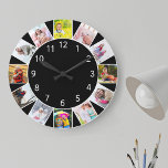 Reloj Redondo Grande Personalizado 12 Collage de fotos Negro gris redon<br><div class="desc">Reloj de fotos personalizado con sus propias fotos personalizados. La plantilla de fotos está preparada para que puedas añadir 12 de tus fotos favoritas trabajando en el sentido de las agujas del reloj desde arriba. Sencillo y fresco, este diseño negro con números blancos luce muy bien con una decoración moderna...</div>