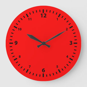 Reloj Redondo Grande Placa negra sobre fondo rojo