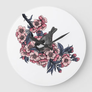 Reloj Redondo Grande Pollo en una rama de cerezo floreciente