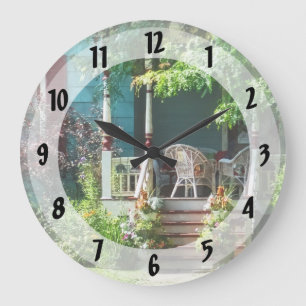 Reloj Redondo Grande Porche con flores y sillas de mimbre