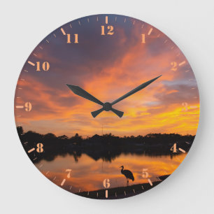 Reloj Redondo Grande Reflexión al atardecer y silueta de grúa arenosa