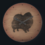 Reloj Redondo Grande Rústica de la silueta pomerana<br><div class="desc">Reloj de pared de Pomeranian Lover. El diseño de madera está impreso,  no de madera real.</div>
