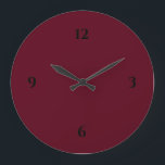 Reloj Redondo Grande Simple vino de Borgoña y negro<br><div class="desc">El reloj moderno presenta un diseño minimalista en una paleta de colores burdeos con acentos negros. Un diseño sencillo y sencillo con números negros sobre un fondo de color burdeos. Una moderna adición a su cocina, sala de estar o pared de oficinas, un moderno regalo de oficina o un moderno...</div>