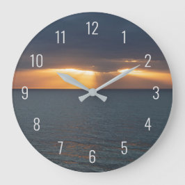 Reloj Redondo Grande Sunset over the ocean breaking through the clouds