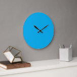 Reloj Redondo Grande Un cuadrado azul centrado en un fondo blanco, crem<br><div class="desc">Este diseño minimalista y elegante presenta un cuadrado azul bellamente centrado en un fondo blanco nítido,  lo que aumenta el impacto visual de los colores contrastantes. Ideal para añadir un toque moderno a cualquier espacio.</div>