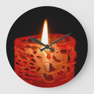 Reloj Redondo Grande Velas en un fondo negro