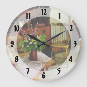Reloj Redondo Grande Wildflowers en la tabla de cocina