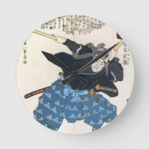 Reloj Redondo Mediano 宮本武蔵 de Musashi Miyamoto con dos Bokken