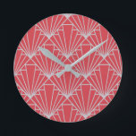 Reloj Redondo Mediano Art Deco<br><div class="desc">This clock has an Art Deco design of diamonds and triangles in silver on a field of burgundy.</div>