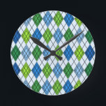 Reloj Redondo Mediano Art Deco Rain Argyle<br><div class="desc">Este reloj de pared tiene un diseño art deco de formas diamantíferas hechas de ángulos superpuestos en líneas negras coloreadas en tonos azules y verdes con líneas negras diagonales que hacen que el diseño parezca un estilo de argyle</div>