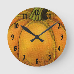 Reloj Redondo Mediano Arte de etiqueta de lata vintage, mariposa calabaz