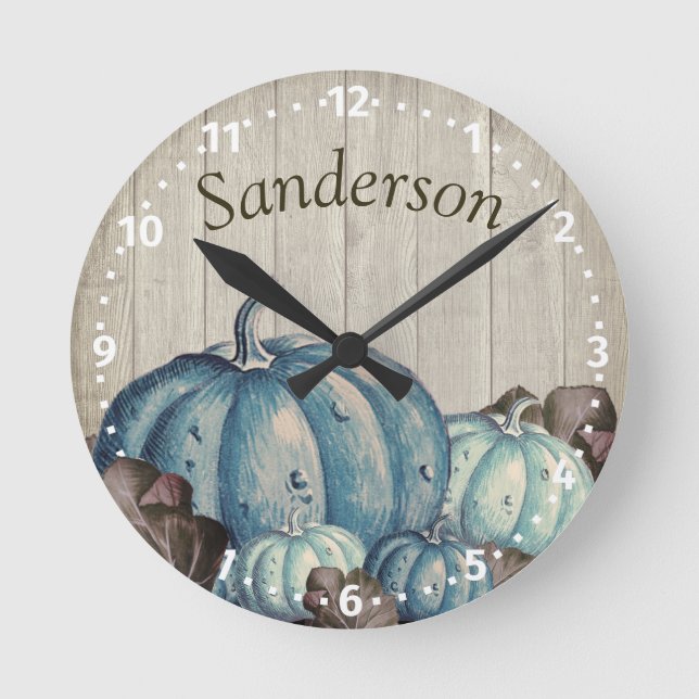 Reloj Redondo Mediano Calabaza Azul Cuta Caída Sale Madera Rústica Crema (Anverso)