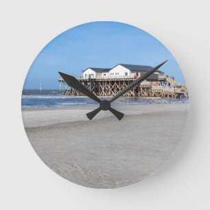 Reloj Redondo Mediano Casa sobre pilotes en la playa de San Pedro Ording
