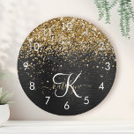 Reloj Redondo Mediano Custom Gold Glitter Black Sparkle Monogram<br><div class="desc">Easily personalize this trendy elegant round clock design featuring pretty gold sparkling glitter on a black brushed metallic background.</div>