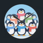 Reloj Redondo Mediano Cute Penguins Winter Scarves Group Hug<br><div class="desc">Adorable gang of cheerful cartoon penguins wrapped in colorful cozy scarves,  huddling together on a snowy blue background. Sweet,  heartwarming and playful,  this charming winter scene radiates joy and friendship.</div>