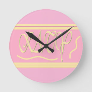 Reloj Redondo Mediano Diseño atómico con letras de color rosa y crema li